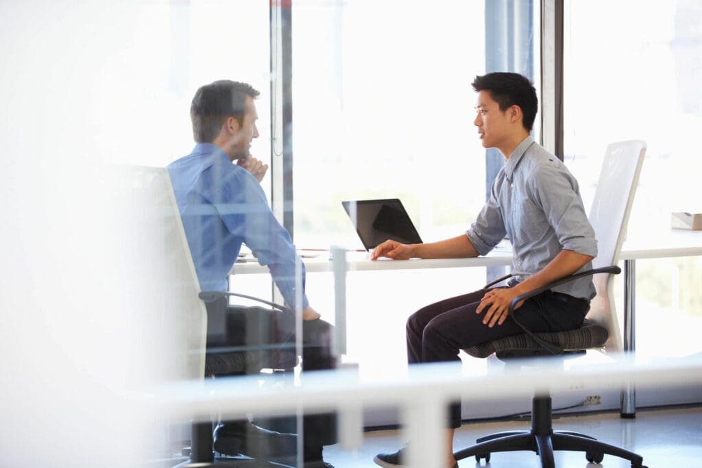 Two men in a meeting