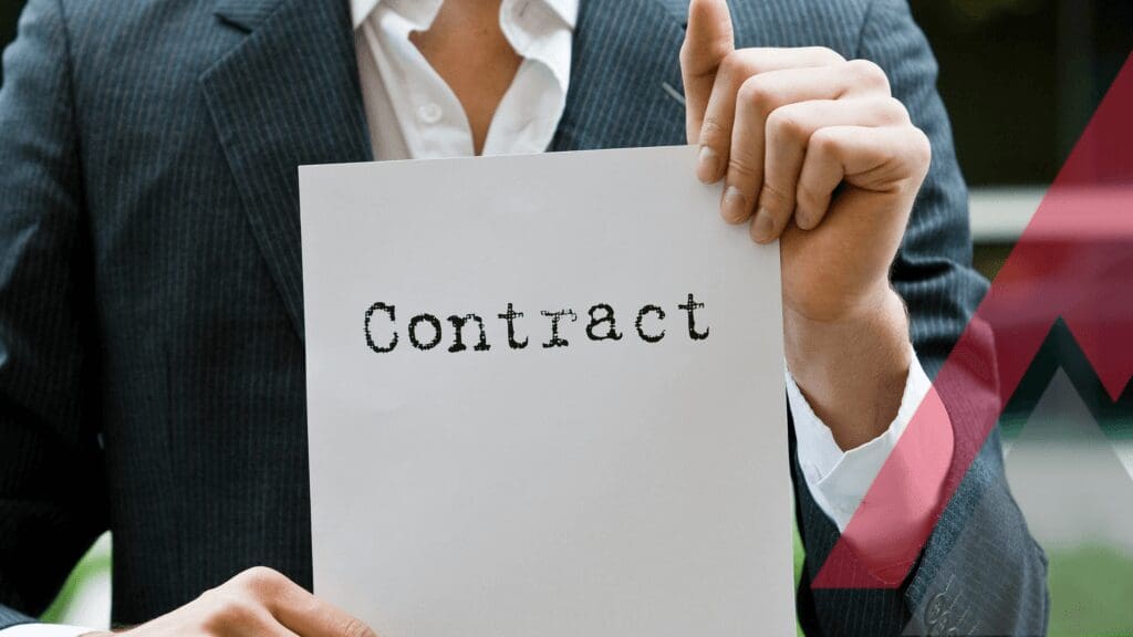 A person holding a contract sheet