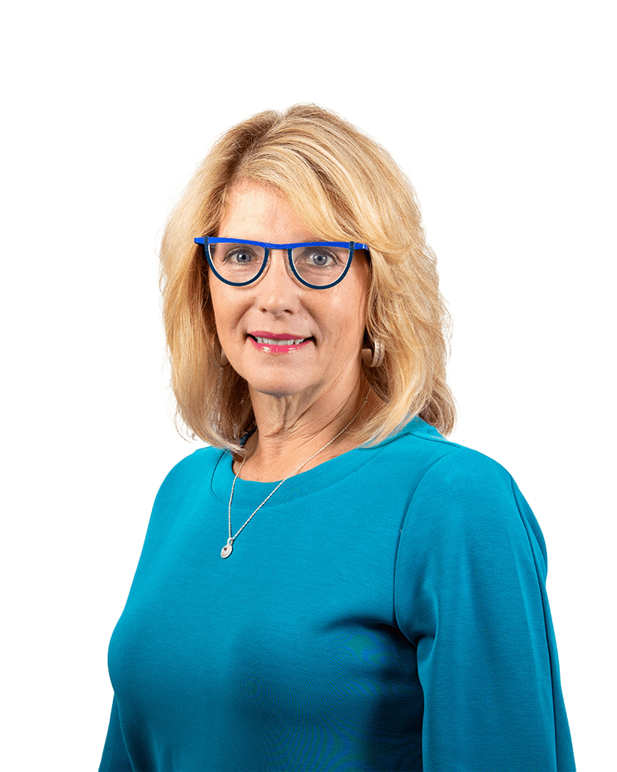 Woman with blonde hair wearing blue glasses.