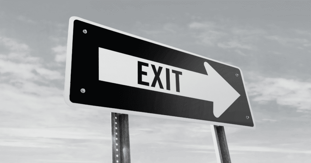 Black and white exit sign, right arrow.