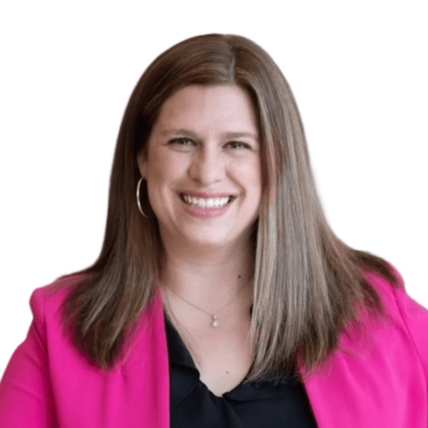 Here's an alt tag for the image: Smiling woman in pink blazer.