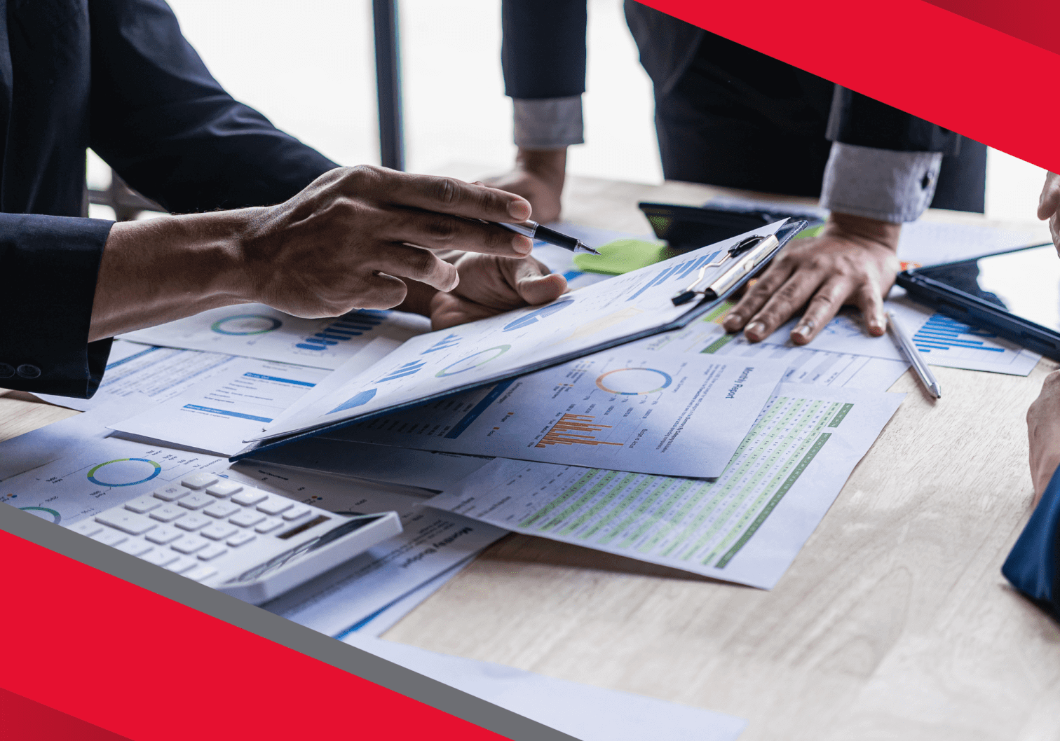 Business people reviewing financial charts.